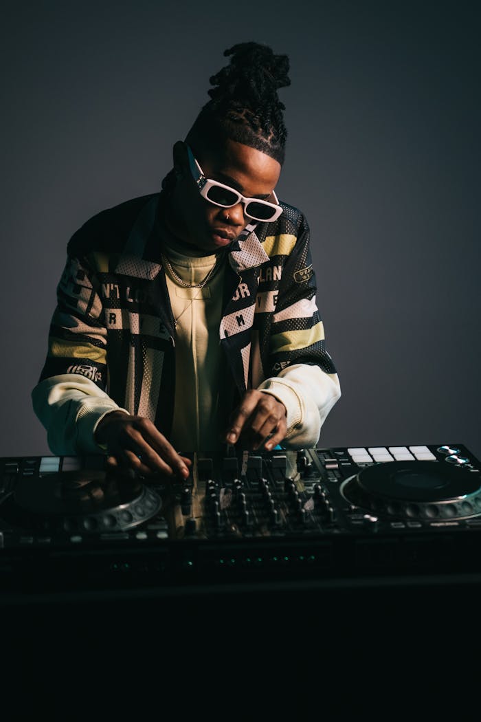 Young Disc Jockey at the Mixing Table